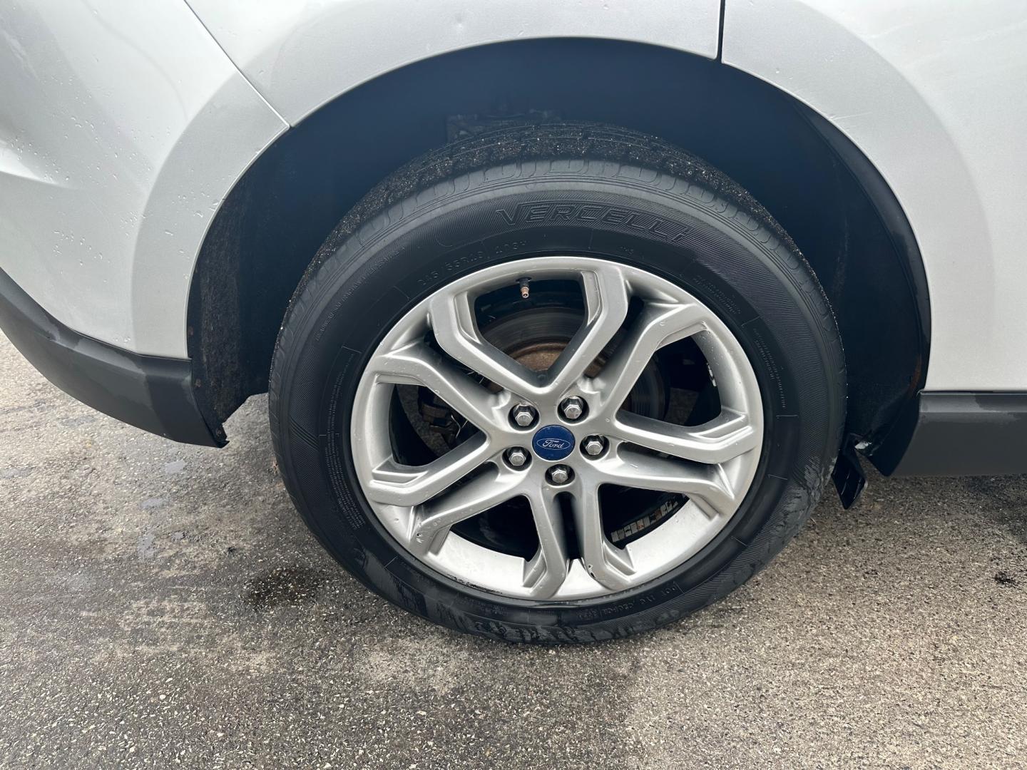 2017 Silver /Black Ford Edge Titanium (2FMPK4K92HB) with an 2.0L I4 DOHC 16V Turbo engine, 6-Speed Automatic transmission, located at 547 E. Main St., Orwell, OH, 44076, (440) 437-5893, 41.535435, -80.847855 - This 2017 Ford Edge Titanium AWD is a well-equipped midsize SUV. It comes with a powerful yet efficient 2.0L EcoBoost engine paired with a smooth 6-speed automatic transmission. Notable features include LED daytime running lights, dusk-sensing headlights, leather interior, auto-dimming rearview mirr - Photo#9